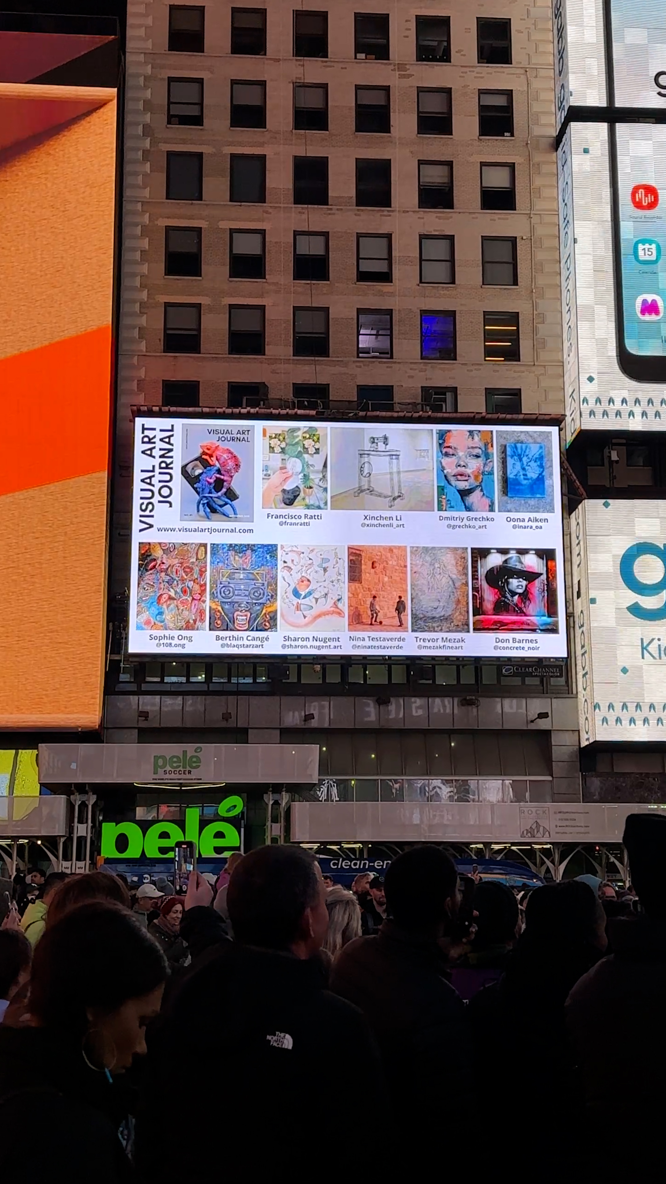 Past Times Square billboard showcase at night